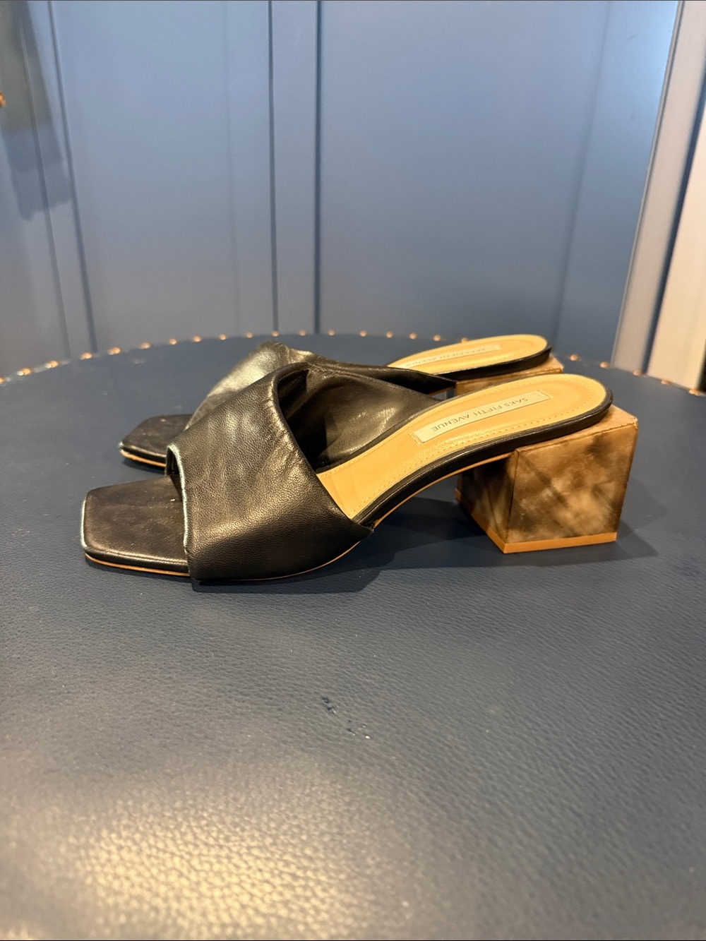 Saks Fifth Ave slides very soft.